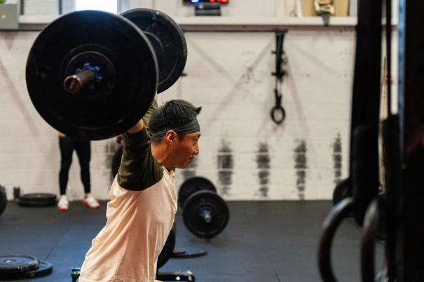 Man lifting barbell